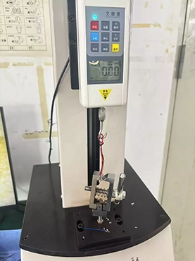 Pull force tester used in wire harness production